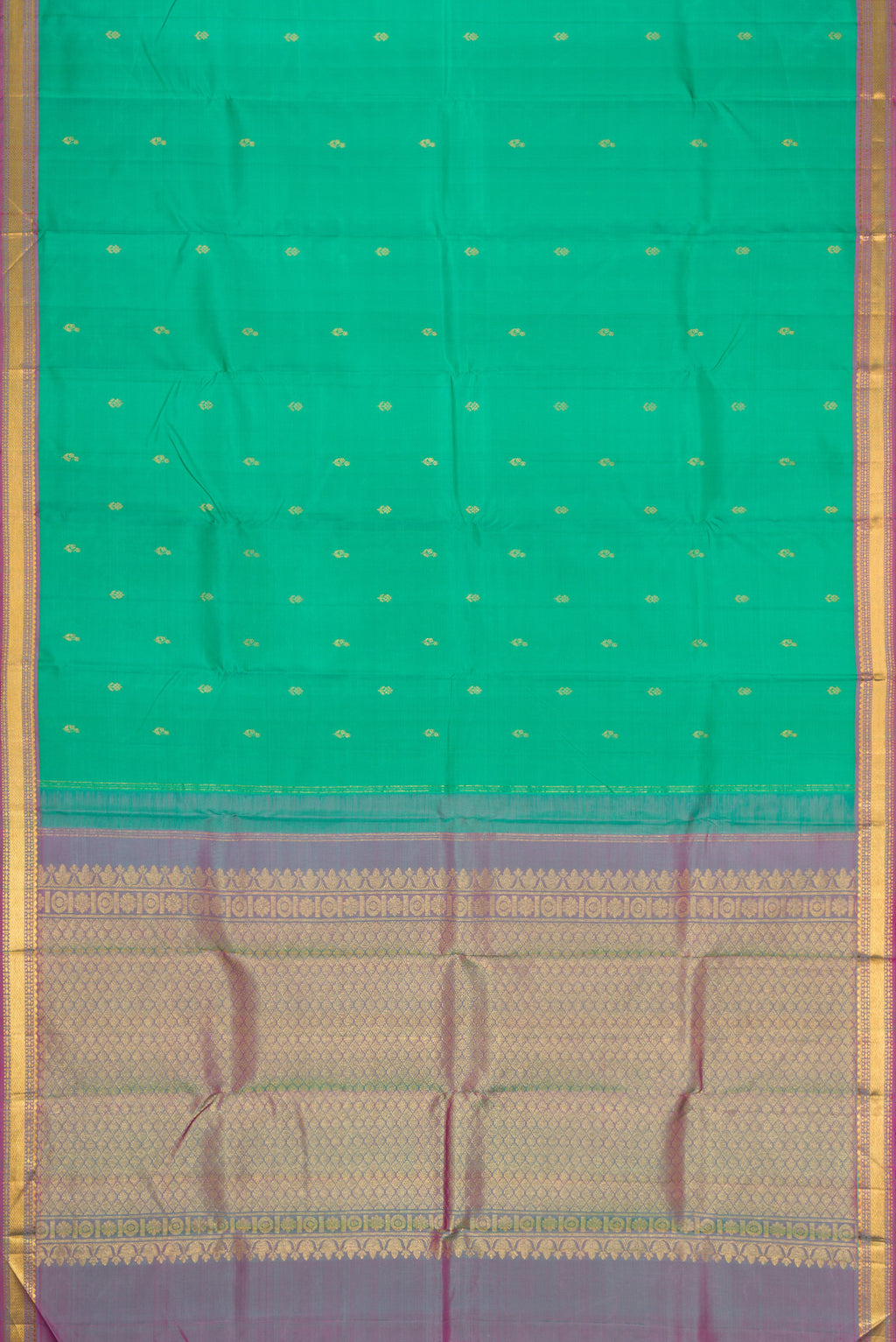 Flat view of Green Dual Tone Kanchipuram Silk Saree with Zari Butta on the body and Zari Border. 
