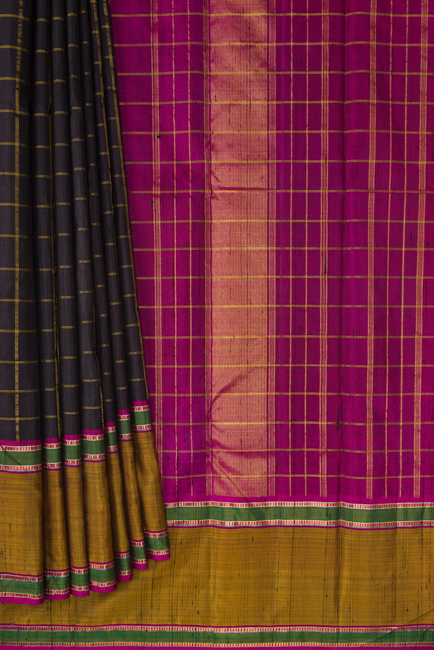 Pleats and pallu of Black Dual Tone Kanchipuram Silk Saree with Checked design on the body and Zari Border. 
