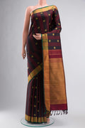 Black Kanchipuram Silk Saree with Zari Butta on the body and Zari Border displayed on a mannequin