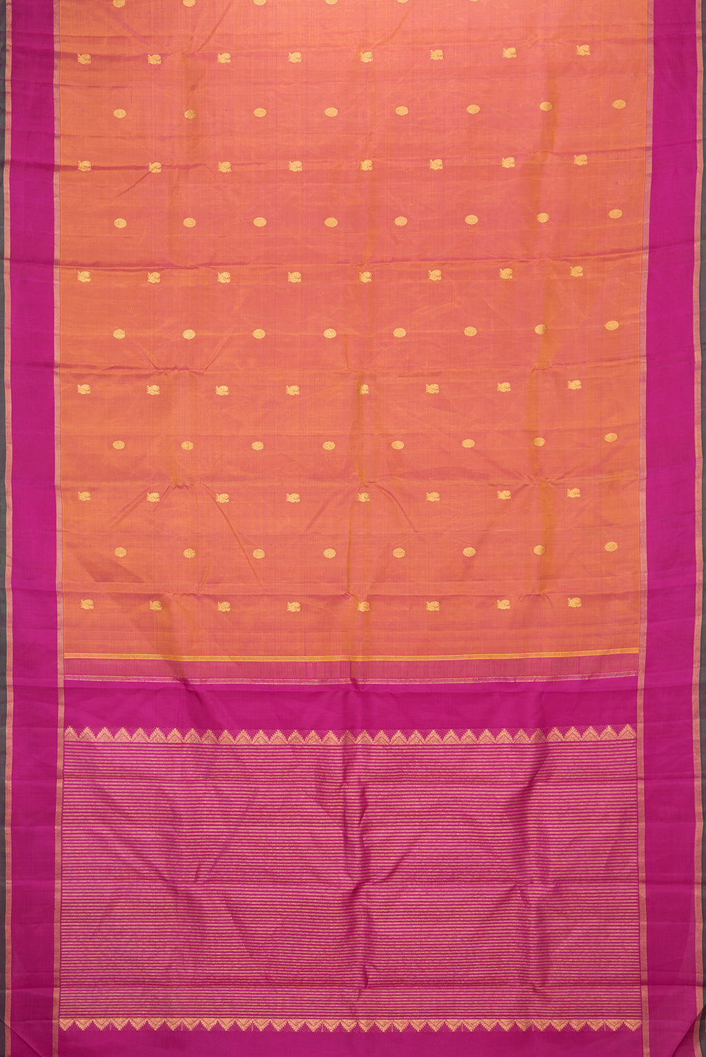 Flat view of Mustard Dual Tone Kanchipuram Silk Saree with Zari Butta on the body and Zari Border. 