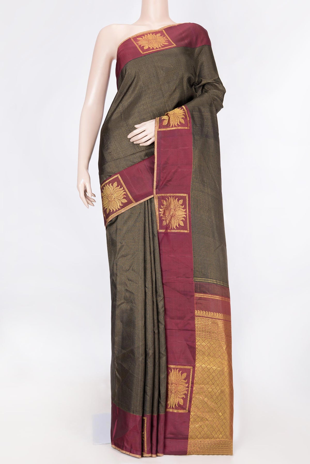 Black Dual Tone Kanchipuram Saree with Stripes on the body and Fancy Border displayed on a mannequin