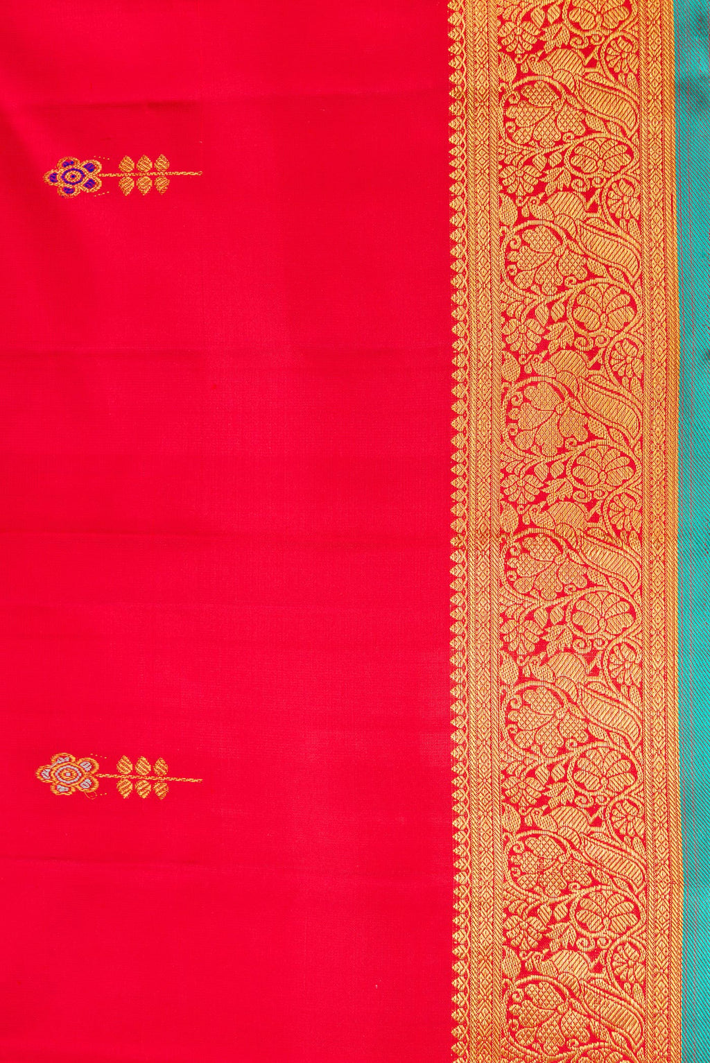 Border image of Red Dual Tone Kanchipuram Silk Saree with Zari And Thread Butta on the body and Zari Border. 