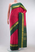 Pink Kanchipuram Silk Saree with Checked design on the body and Zari Border displayed on a mannequin