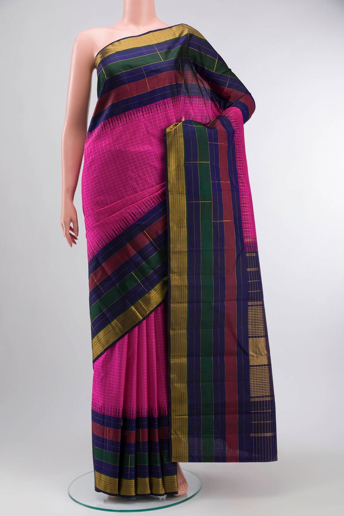 Pink Kanchipuram Silk Saree with Checked design on the body and Zari Border displayed on a mannequin