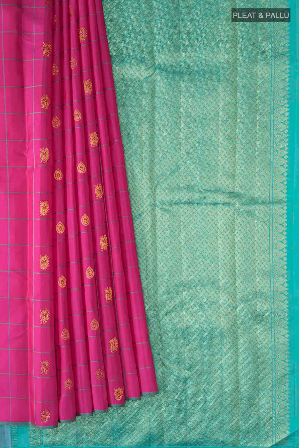 Pleats and pallu of Pink Kanchipuram Silk Saree with Zari Butta on the body and Plain Border