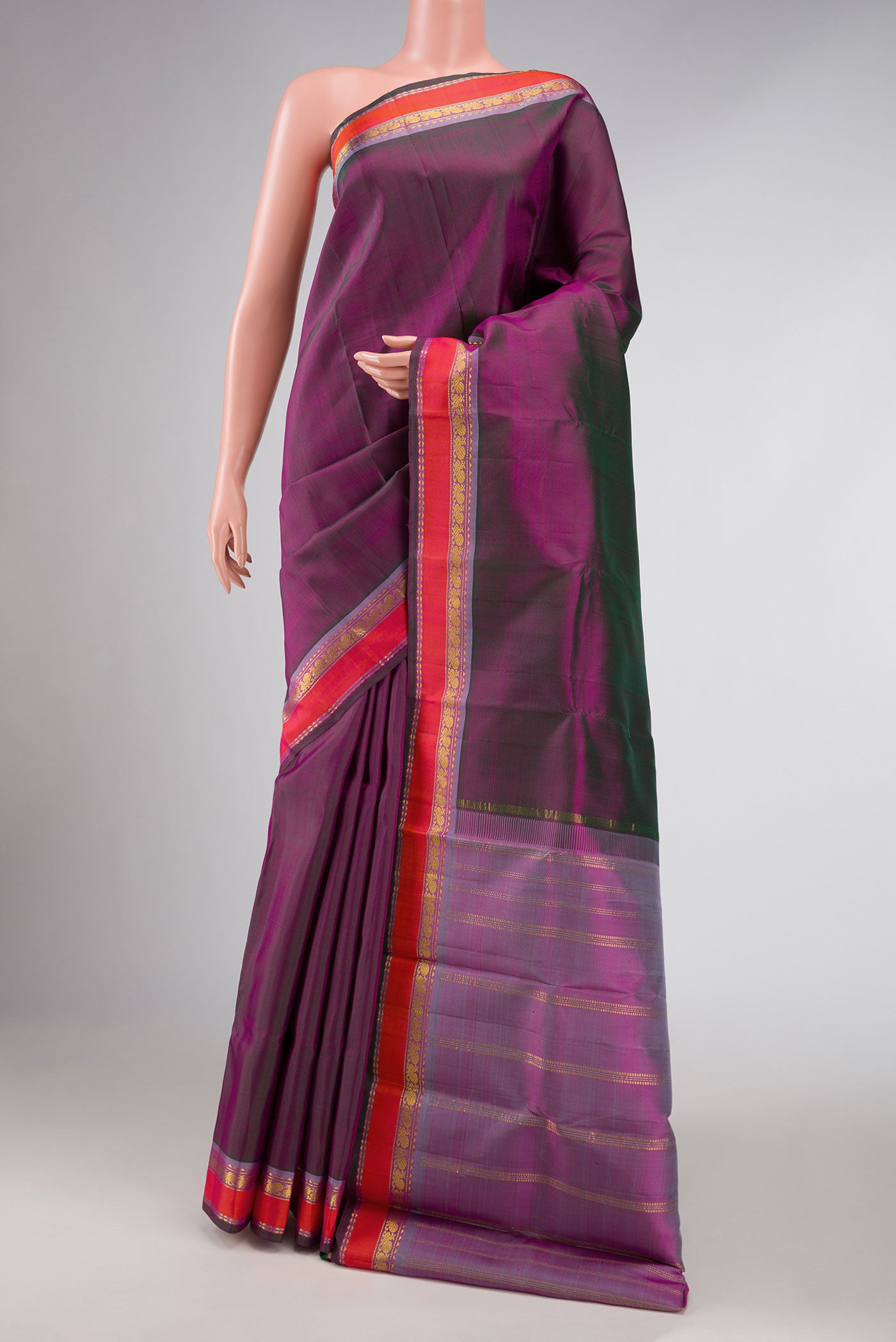 Purple Dual Tone Kanchipuram Silk Saree with Plain Body and Zari Border displayed on a mannequin