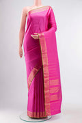 Pink Kanchipuram Silk Saree with Checked design on the body and Zari Border displayed on a mannequin