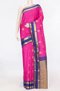 Pink Dual Tone Kanchipuram Saree with Zari Butta on the body and Zari Border displayed on a mannequin