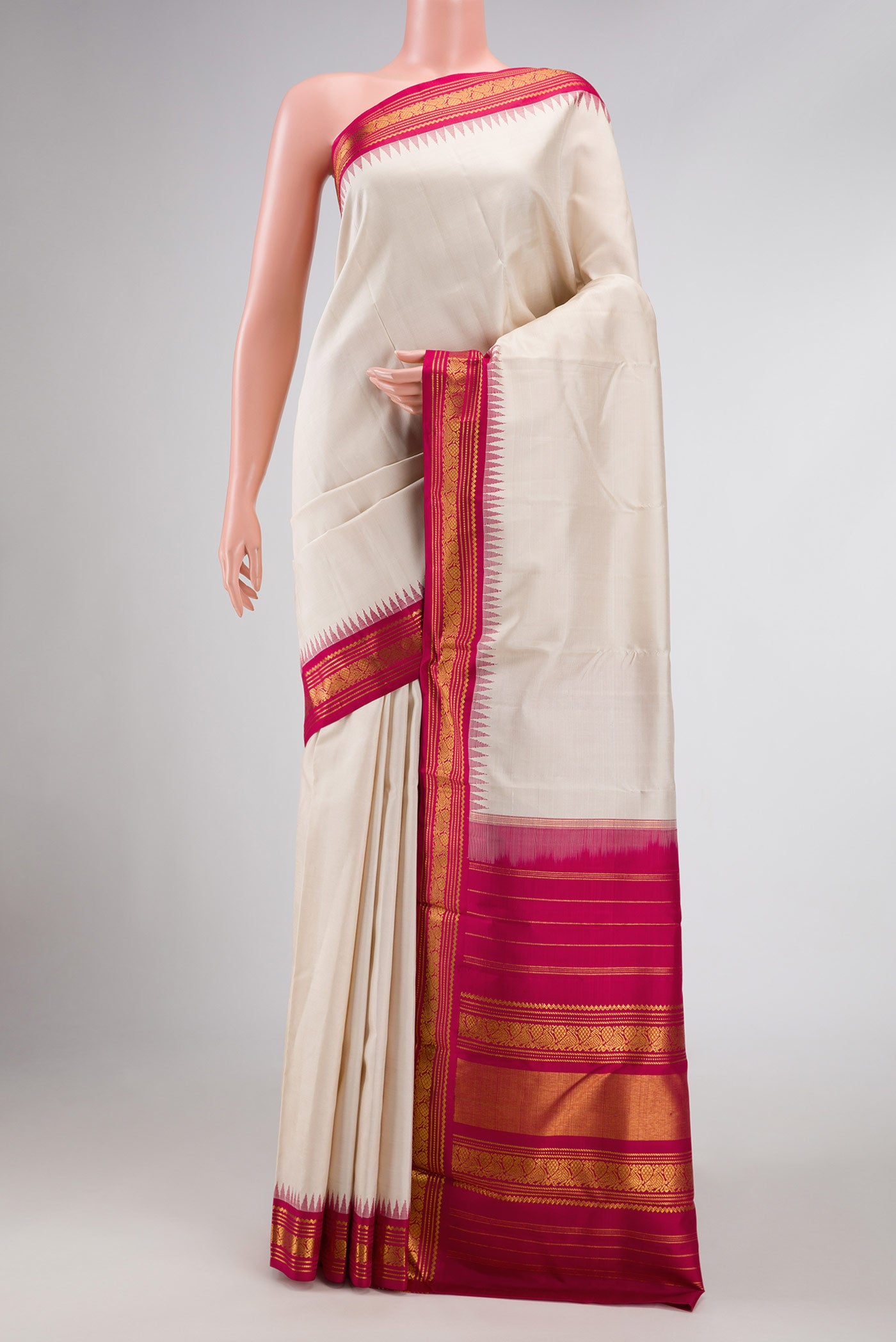 Pure Silk Pure Zari Off White Dual Tone Kanchipuram Saree with Plain Body and Zari Border displayed on a mannequin