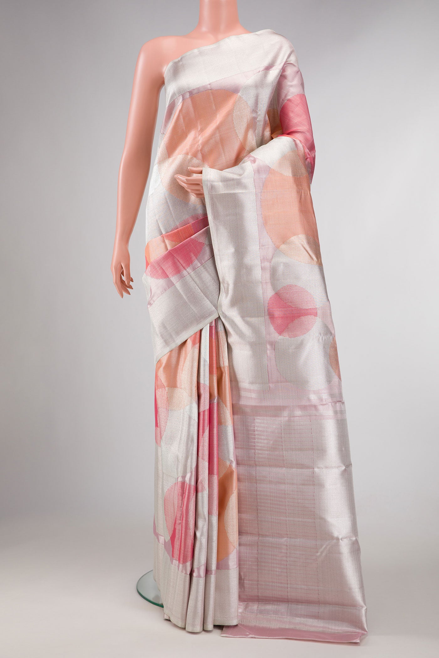 Pink , Maroon and Orange Dual Tone Kanchipuram Silk Saree with Zari Brocade on the body and Zari Border displayed on a mannequin
