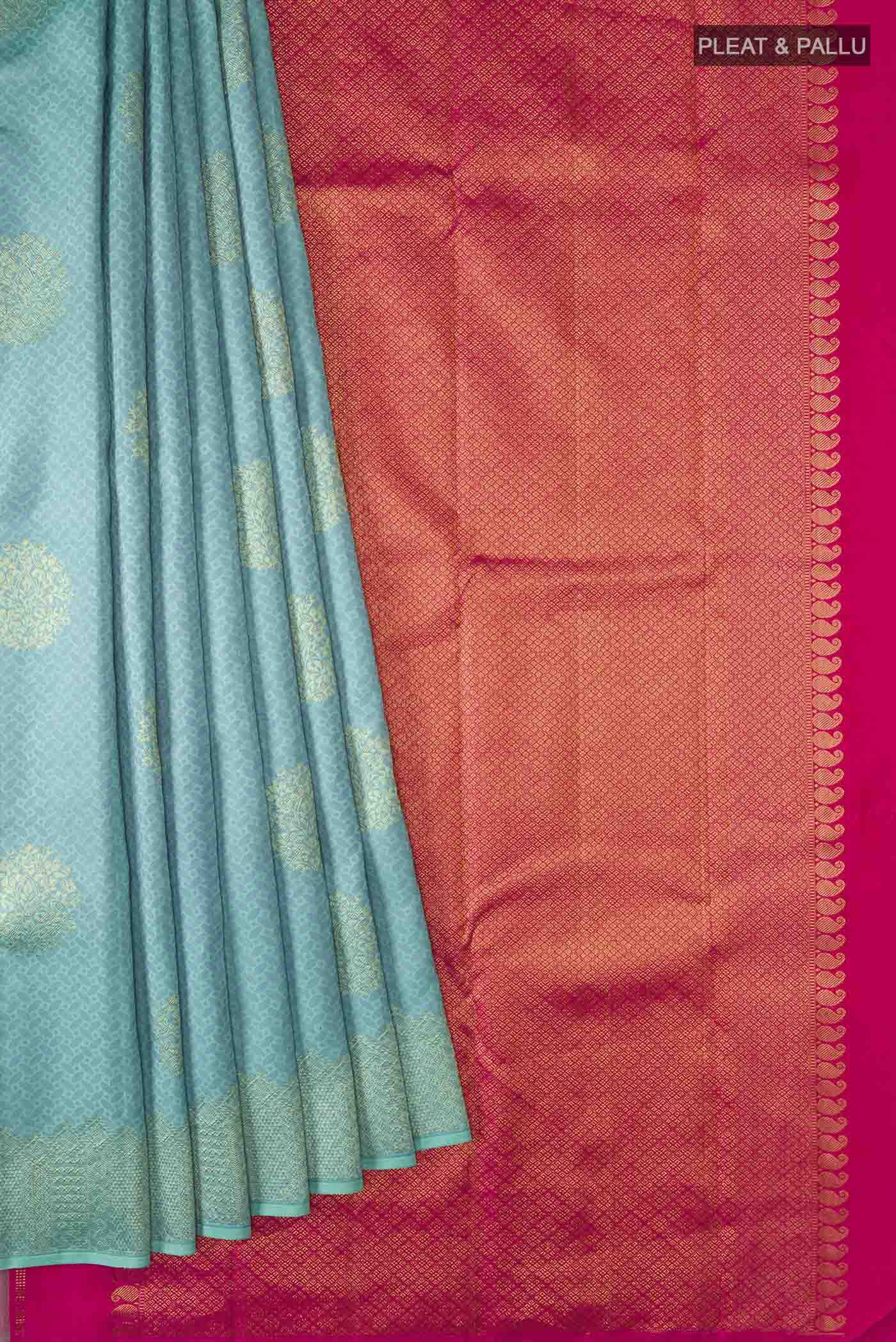 Pleats and pallu of Green Kanchipuram Silk Saree with Jacquard With Zari Butta on the body and Without Border
