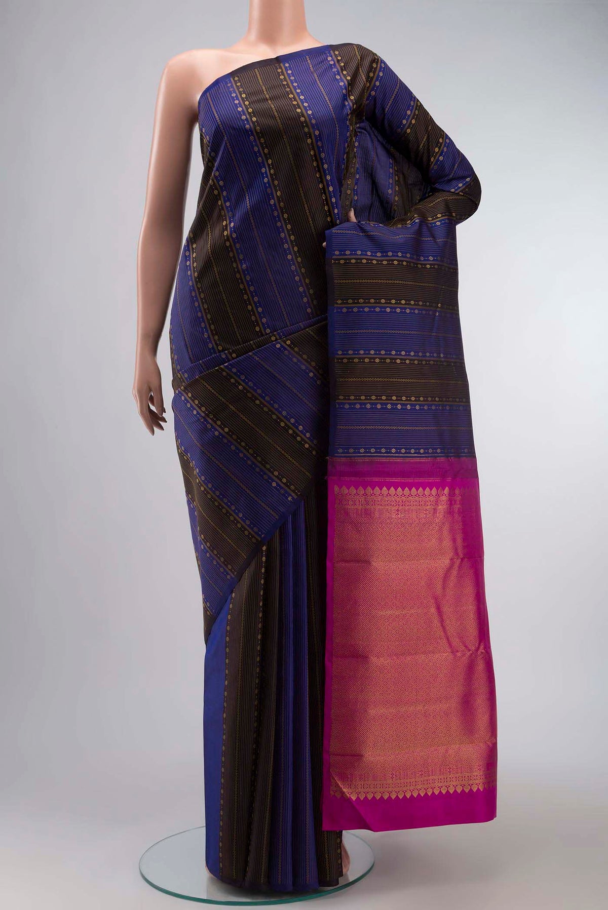 Multi Color Kanchipuram Silk Saree with Stripes on the body and Without Border displayed on a mannequin