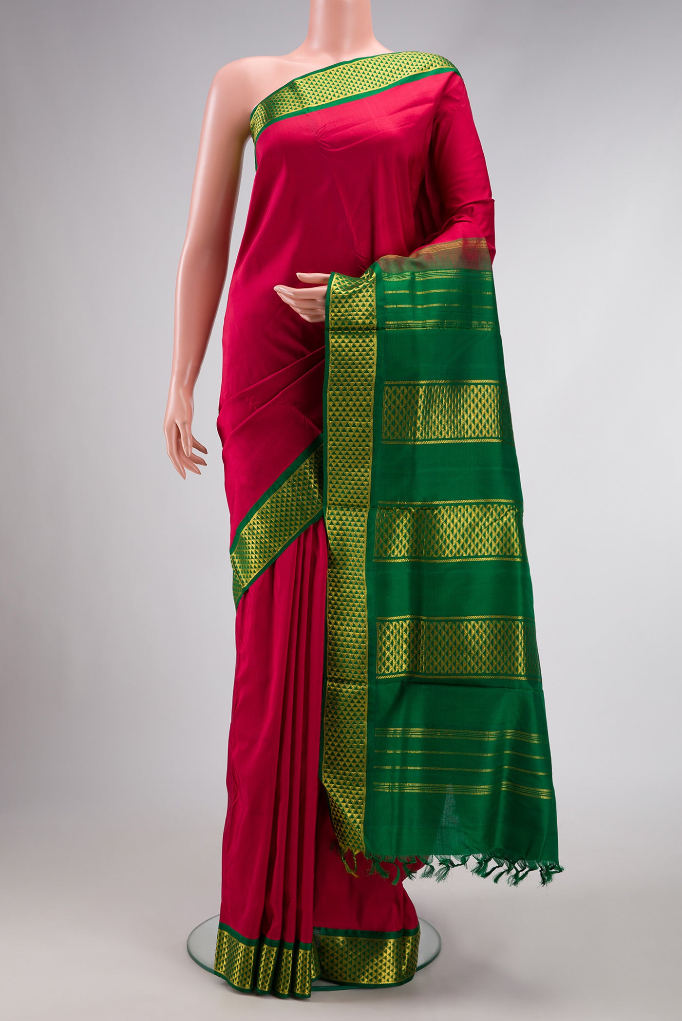 Pure Silk Pure Zari Maroon Dual Tone Kanjivaram Nine Yards Saree with Plain Body and Zari Border.  displayed on a mannequin