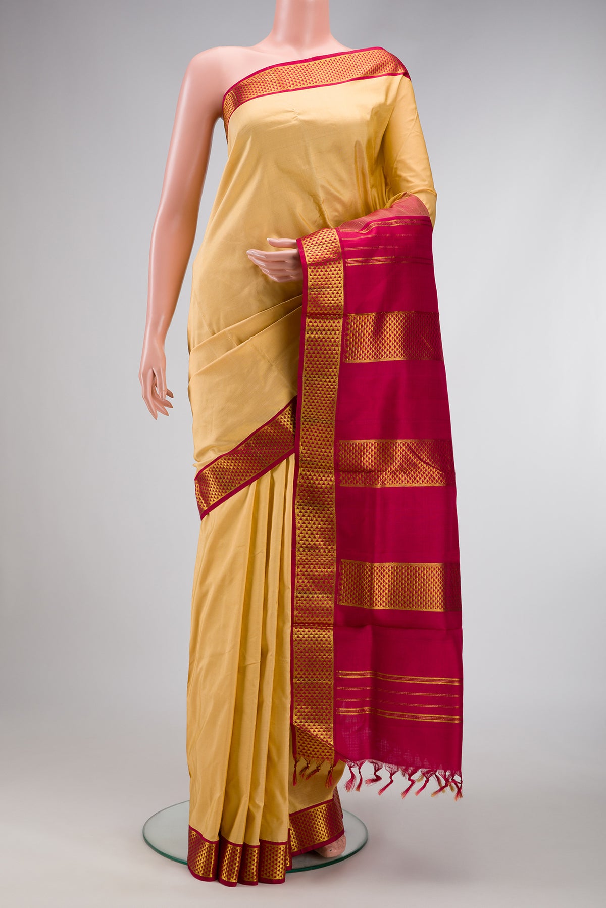 Sandal Dual Tone Kanjivaram Silk Nine Yards Saree with Stripes on the body and Zari Border.  displayed on a mannequin