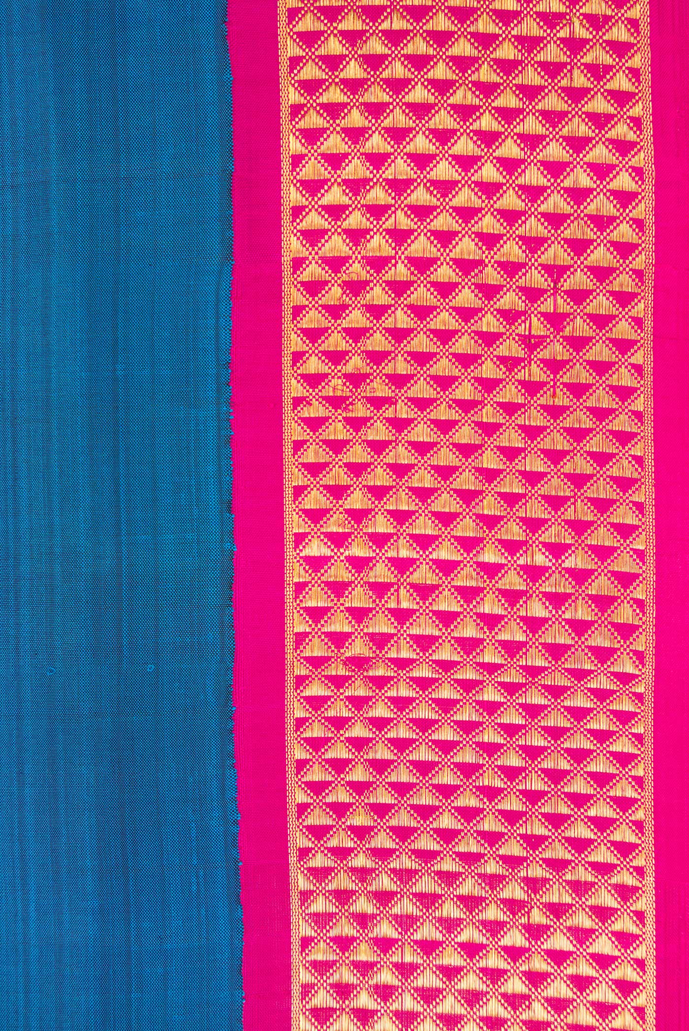 Border image of Pure Silk Pure Zari Peacock Blue Dual Tone Kanjivaram Nine Yards Saree with Plain Body and Zari Border. 