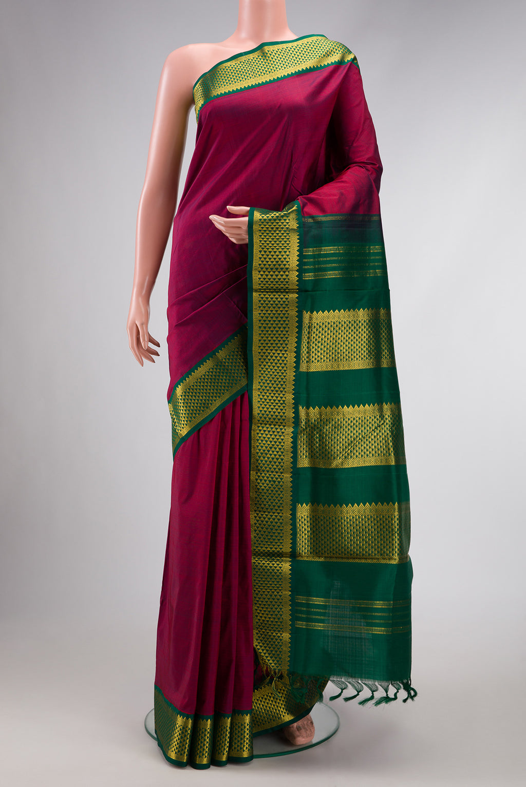 Pure Silk Pure Zari Maroon Dual Tone Kanjivaram Nine Yards Saree with Plain Body and Zari Border.  displayed on a mannequin