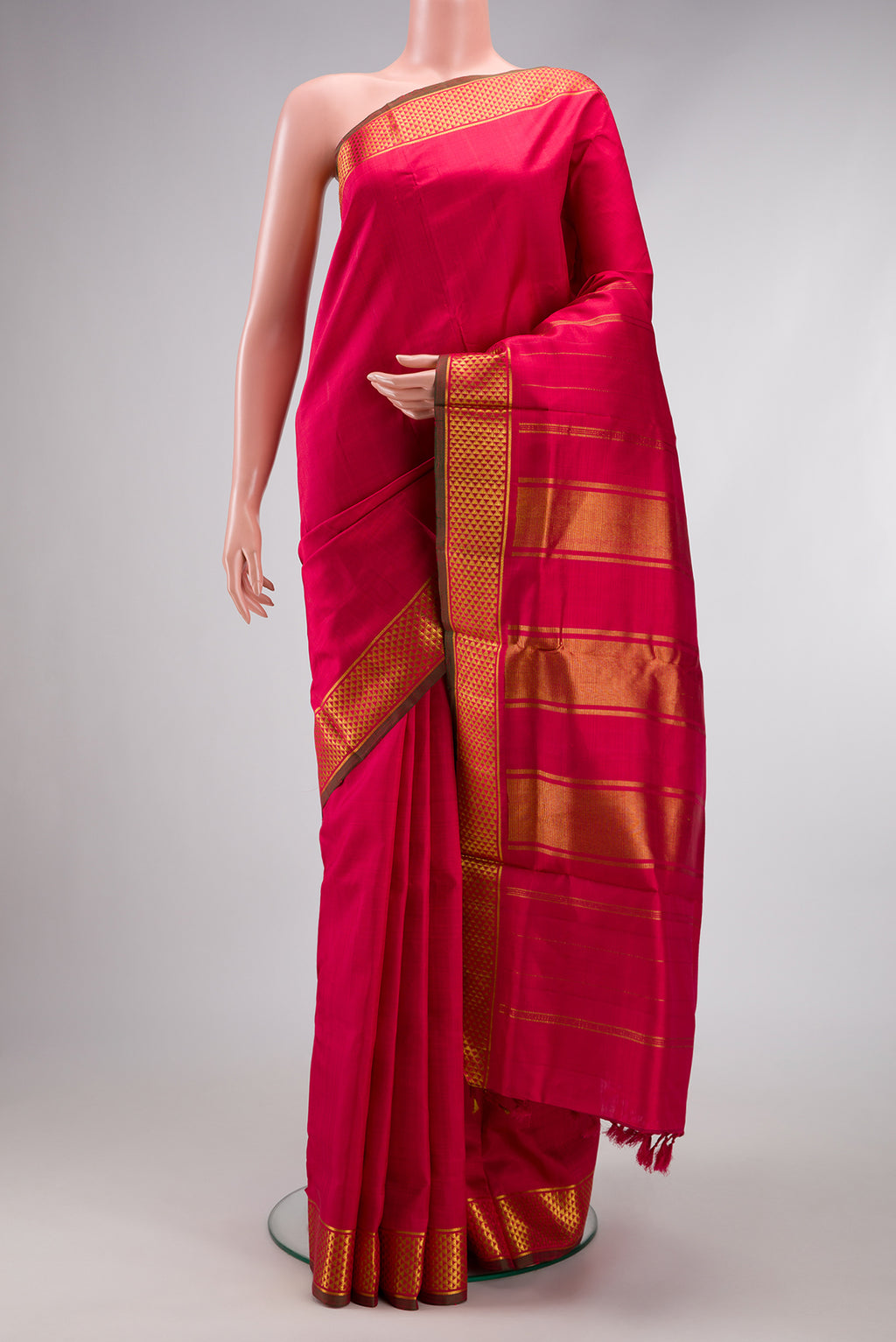 Maroon Kanjivaram Silk Nine Yards Saree with Plain Body and Zari Border.  displayed on a mannequin