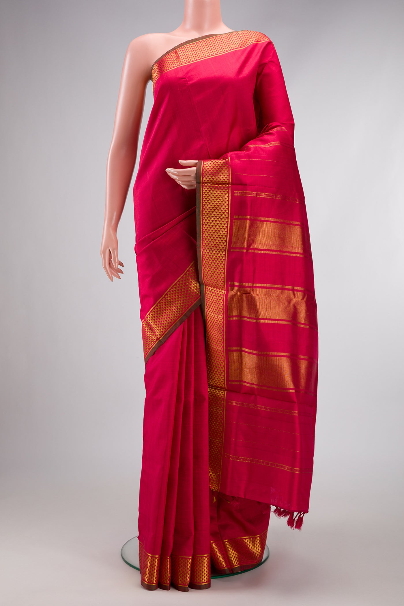 Maroon Kanjivaram Silk Nine Yards Saree with Plain Body and Zari Border.  displayed on a mannequin