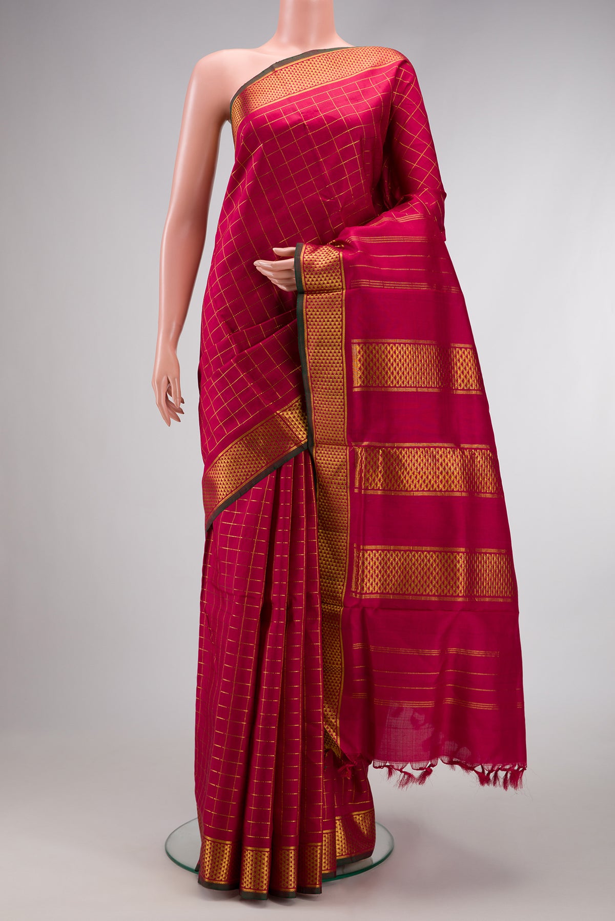 Red Dual Tone Kanjivaram Silk Nine Yards Saree with Checked design on the body and Zari Border.  displayed on a mannequin