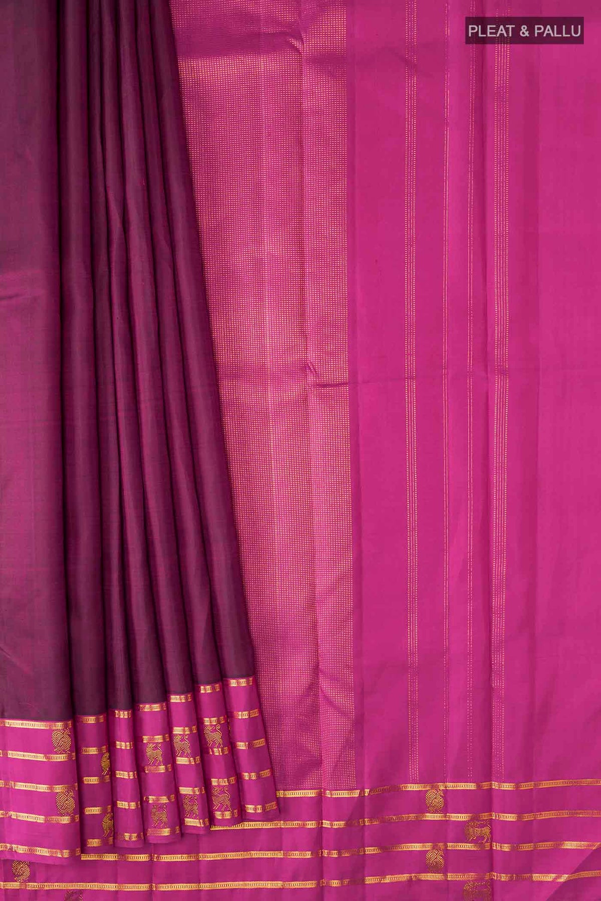 Pleats and pallu of Maroon Kanchipuram Silk Saree with Plain Body and Zari Border