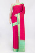 Pink Dual Tone Kanchipuram Saree with Plain Body and Zari Border displayed on a mannequin