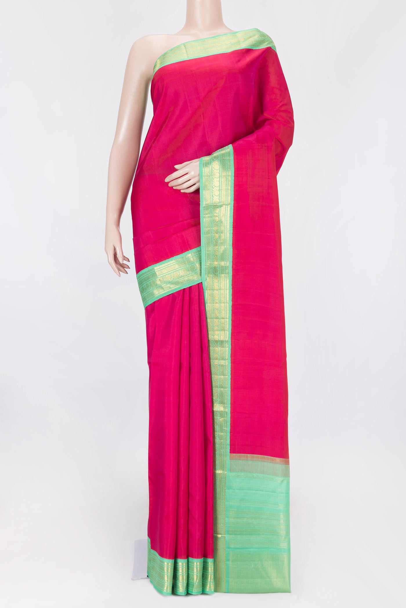 Pink Dual Tone Kanchipuram Saree with Plain Body and Zari Border displayed on a mannequin