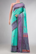 Sky Blue Dual Tone Kanchipuram Silk Saree with Thread Butta on the body and Thread Border displayed on a mannequin
