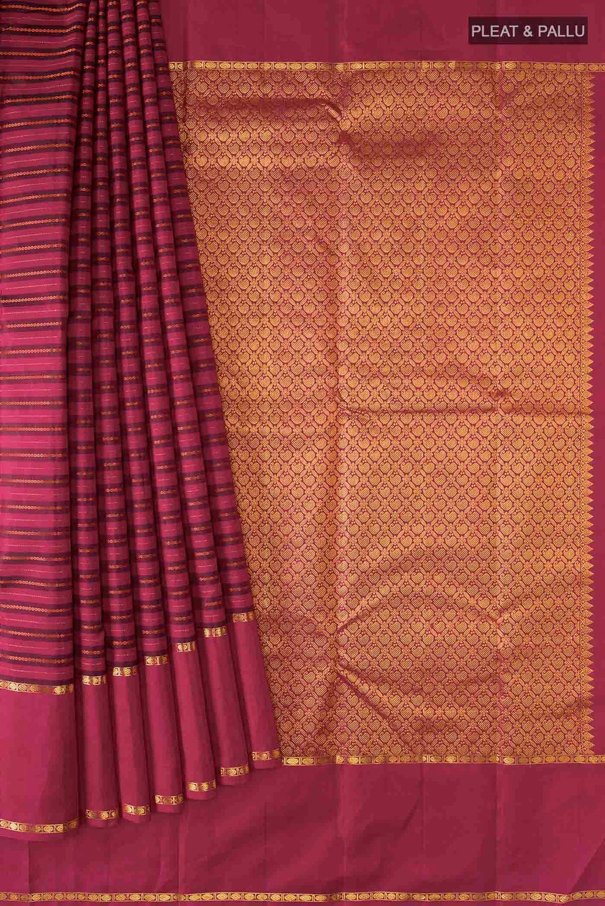 Pleats and pallu of Maroon Kanchipuram Silk Saree with Stripes on the body and Zari Border