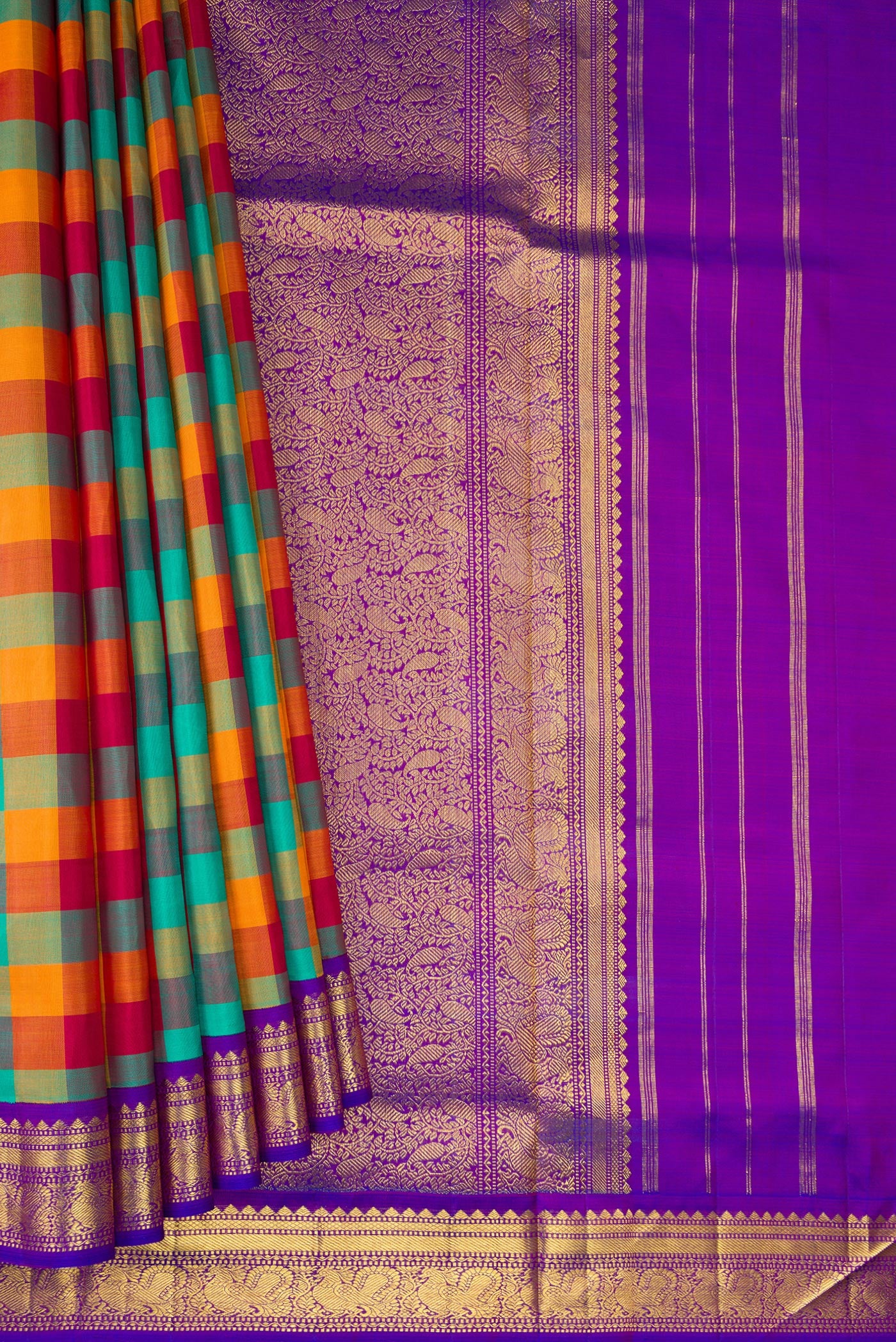 Pleats and pallu of Pure Silk Pure Zari Green , Pink and Orange Color Kanchipuram Nine Yards Saree with Checked design on the body and Zari Border. 