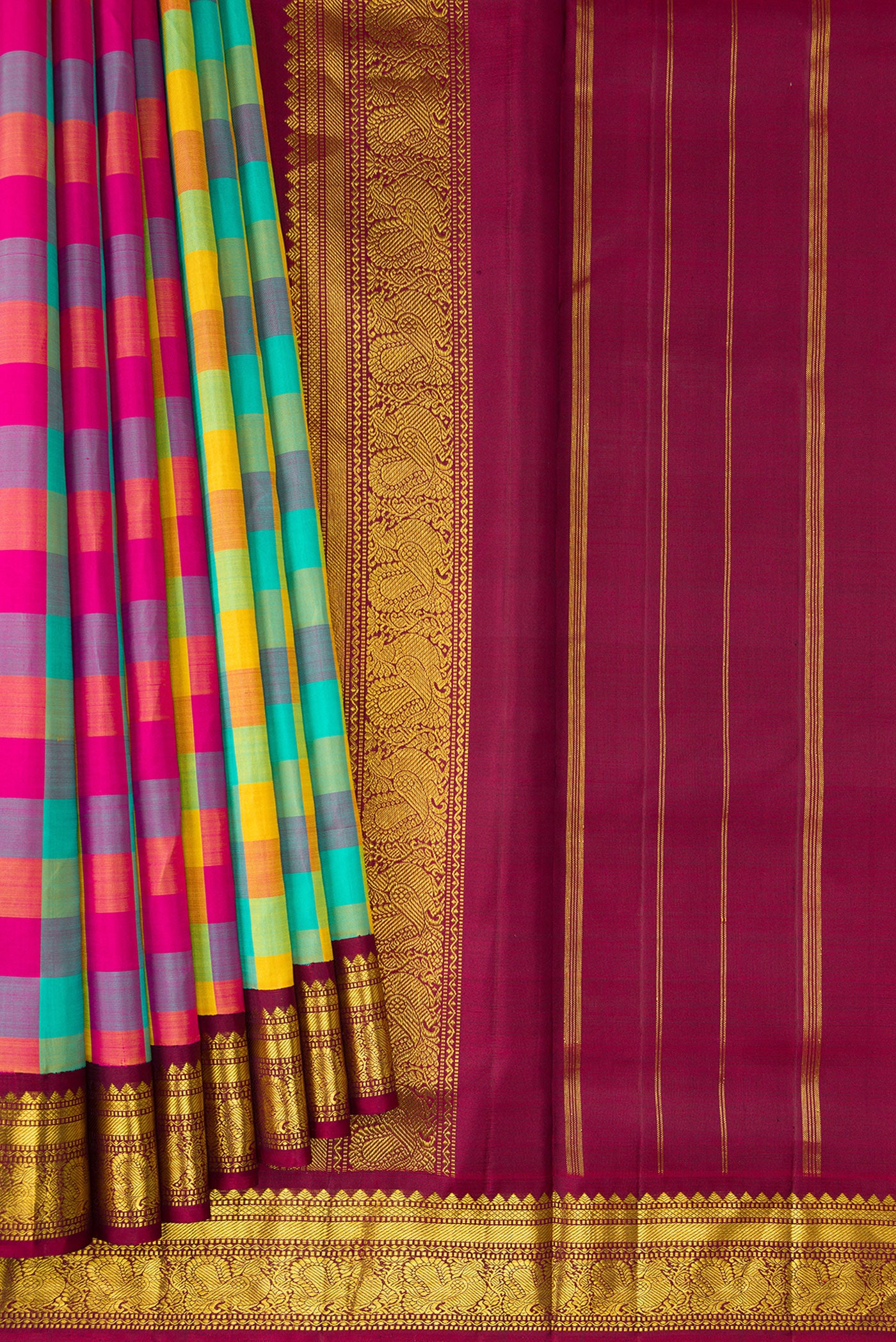 Pleats and pallu of Pure Silk Pure Zari Sea Green , Yellow and Dark PInk Color Kanchipuram Nine Yards Saree with Checked design on the body and Zari Border. 