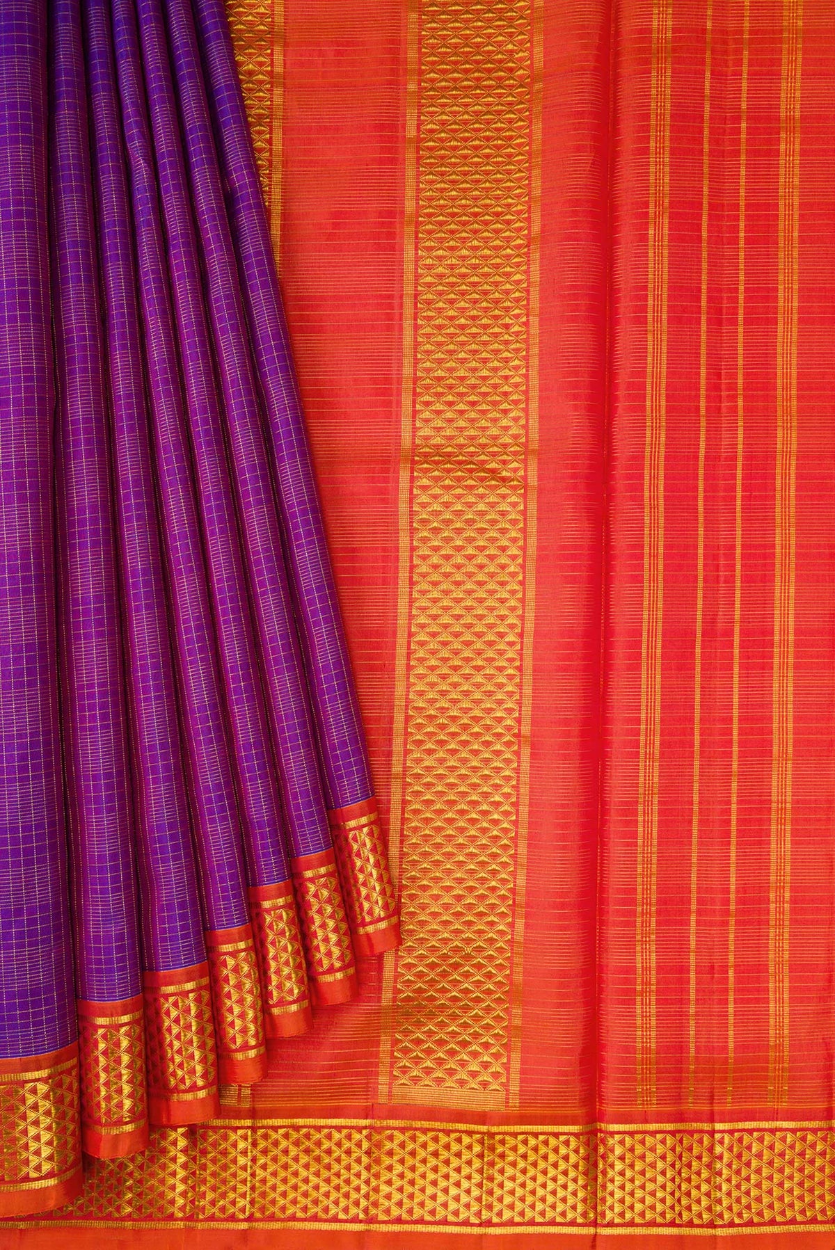 Pleats and pallu of Pure Silk Pure Zari Royal Blue Dual Tone Kanjivaram Nine Yards Saree with Checked design on the body and Zari Border. 