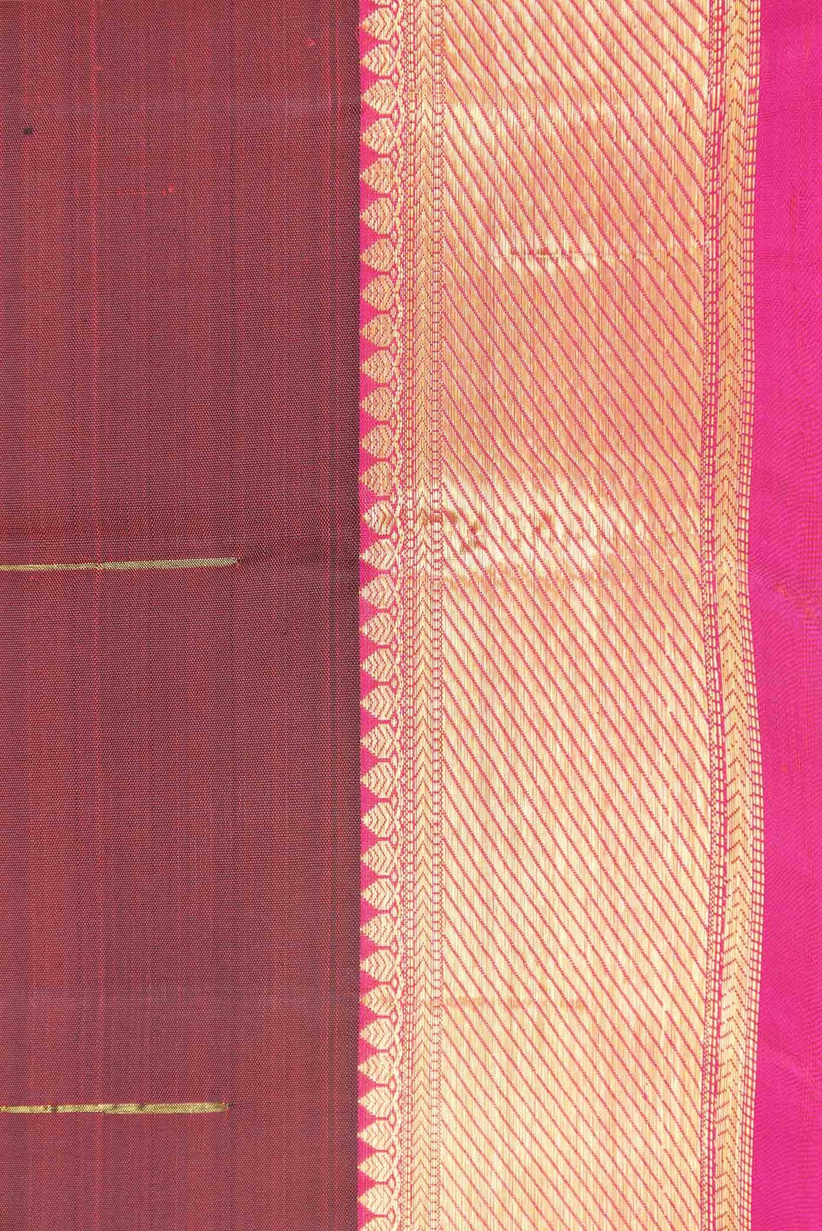 Border image of Maroon Dual Tone Kanchipuram Saree with Zari Butta on the body and Zari Border