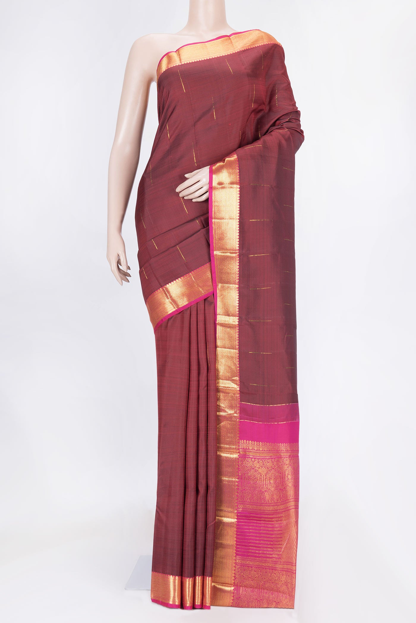 Maroon Dual Tone Kanchipuram Saree with Zari Butta on the body and Zari Border displayed on a mannequin