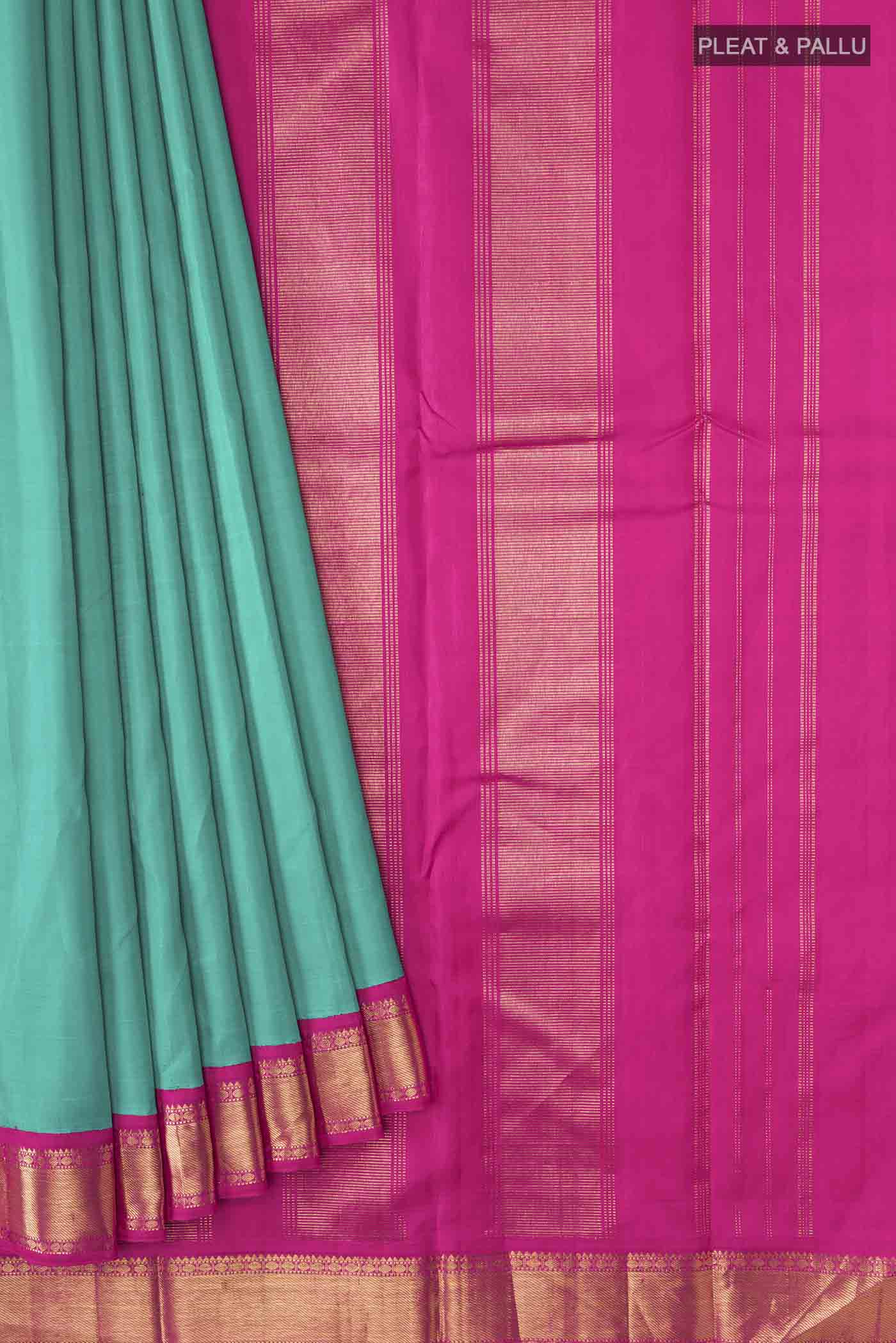 Pleats and pallu of Green Kanchipuram Silk Saree with Plain Body and Zari Border