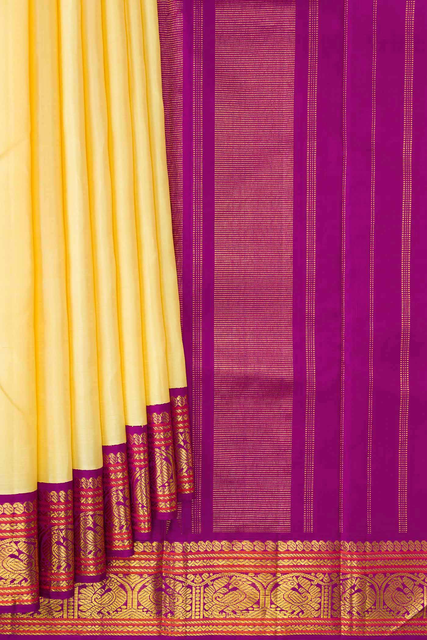 Pleats and pallu of Sandal Dual Tone Kanjivaram Silk Saree with Plain Body and Zari Border. 