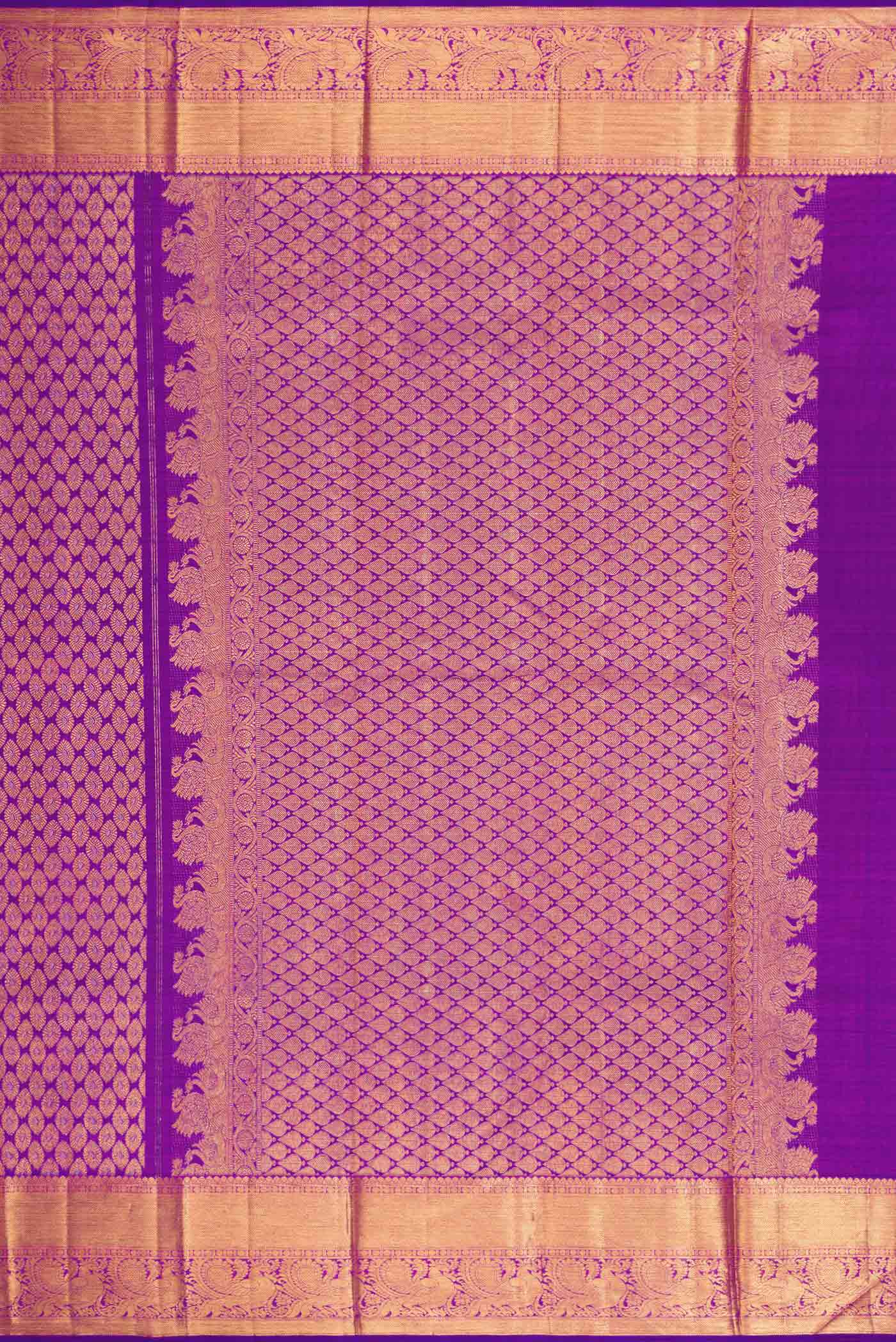 Close up image of the pallu of Purple Dual Tone Kanchipuram Silk Saree with Zari Brocade on the body and Zari Border. 