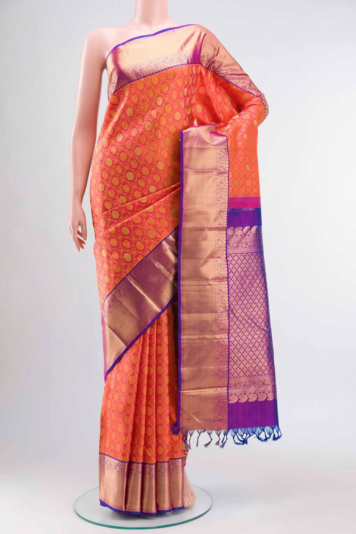 Pink Kanchipuram Silk Saree with Jacquard With Zari Butta on the body and Zari Border displayed on a mannequin