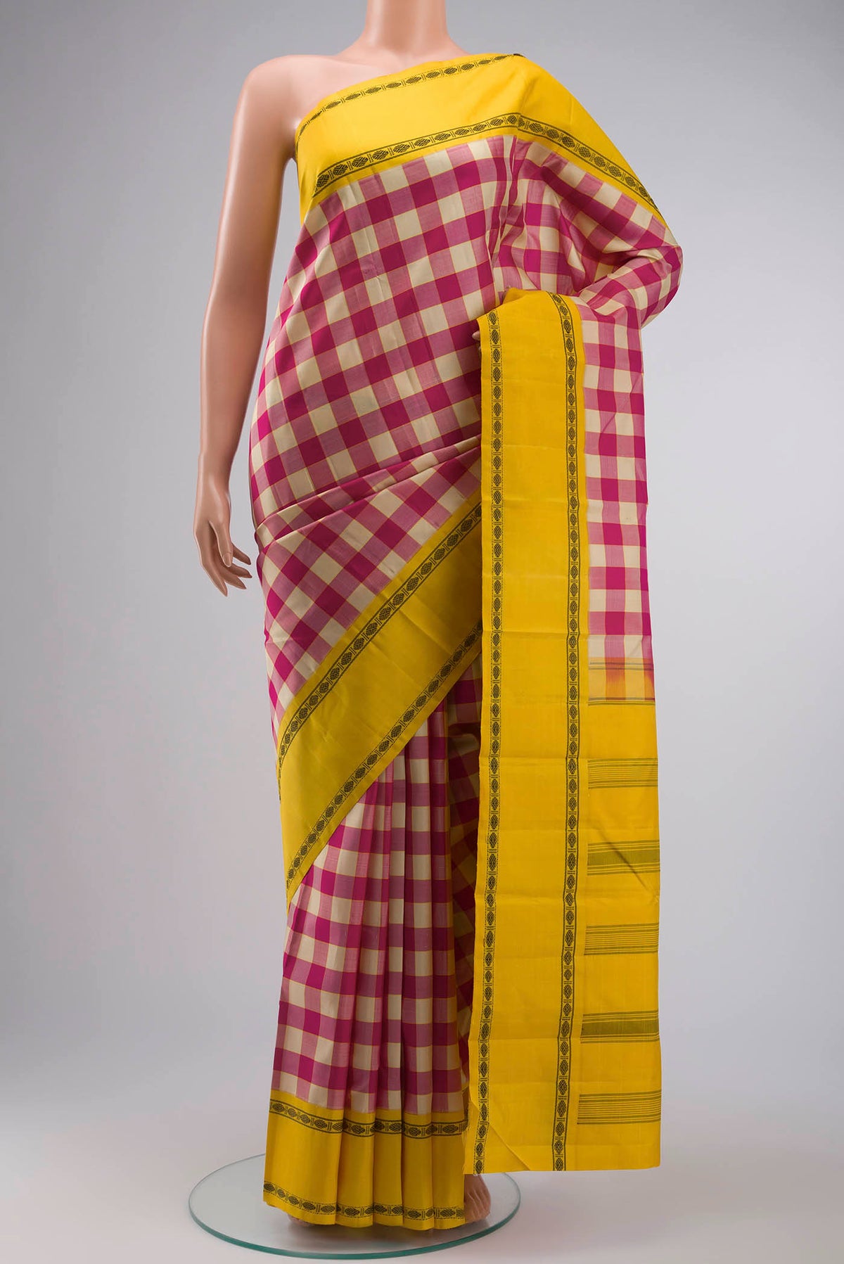 Multi Color Kanchipuram Silk Saree with Checked design on the body and Thread Border displayed on a mannequin