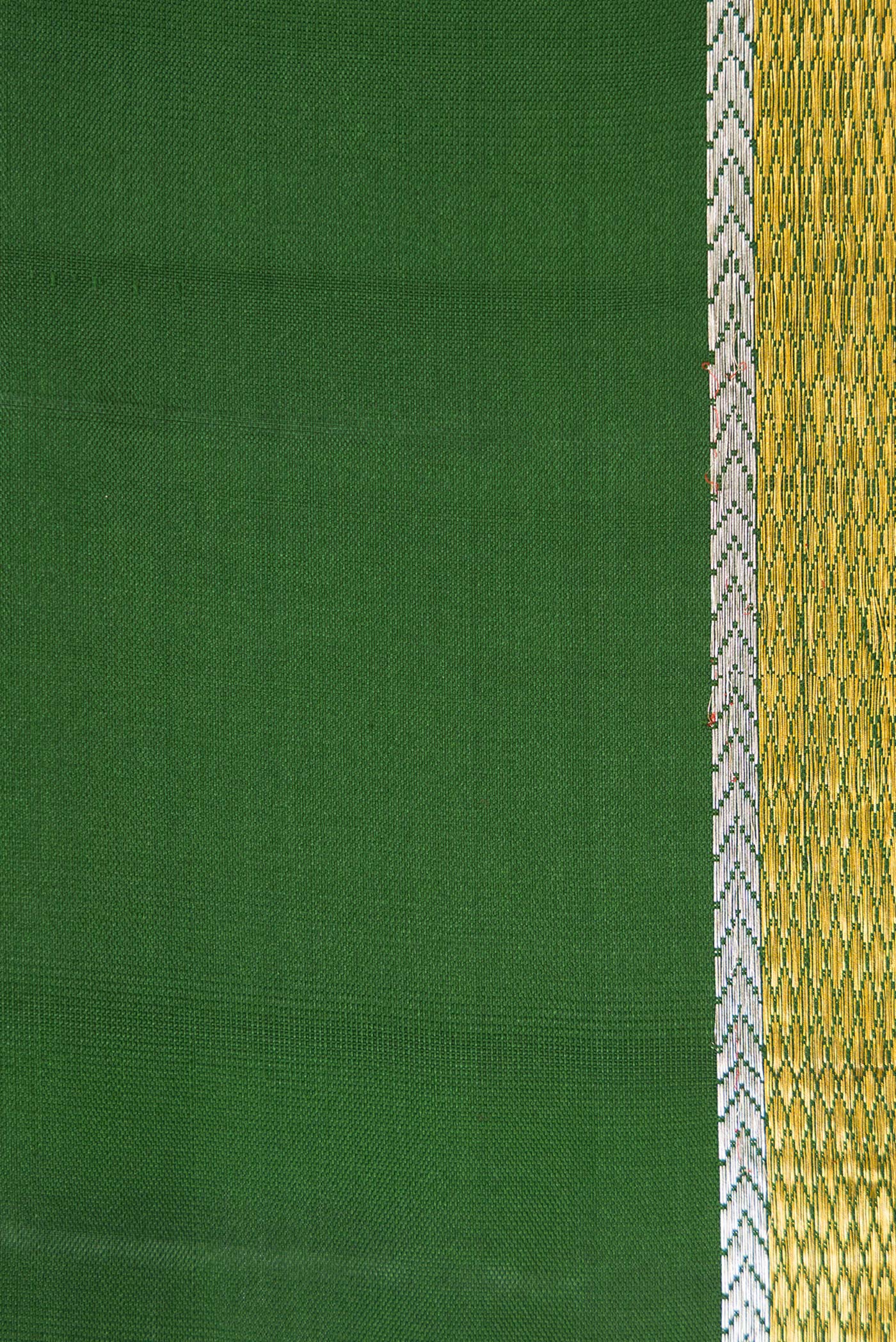 Border image of Bottle Green Dual Tone Soft Silk Saree with Plain Body and Zari Border. 