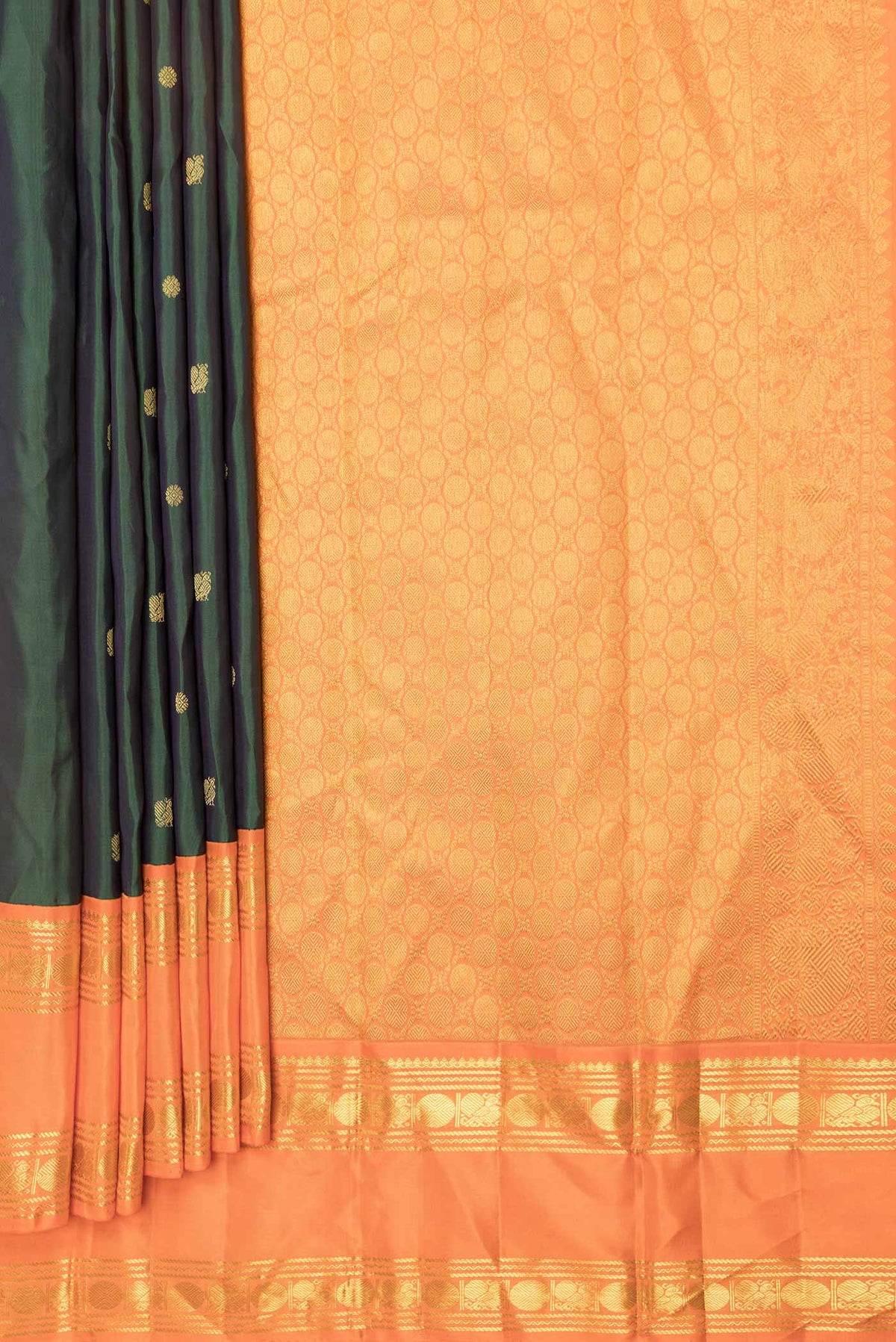 Pleats and pallu of Green Dual Tone Kanchipuram Saree with Zari Butta on the body and Zari Border