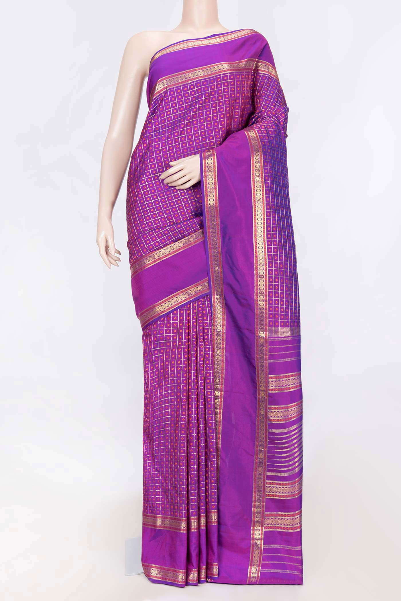 Purple Dual Tone Kanchipuram Saree with Zari And Thread Butta on the body and Zari Border displayed on a mannequin