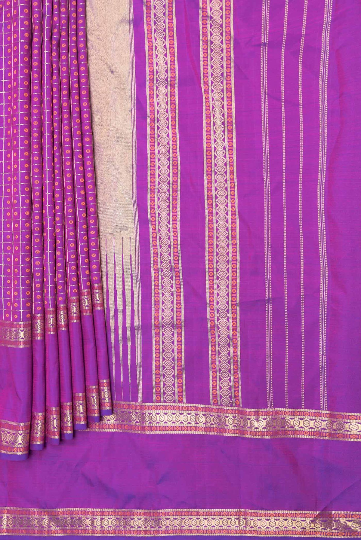 Pleats and pallu of Purple Dual Tone Kanchipuram Saree with Zari And Thread Butta on the body and Zari Border