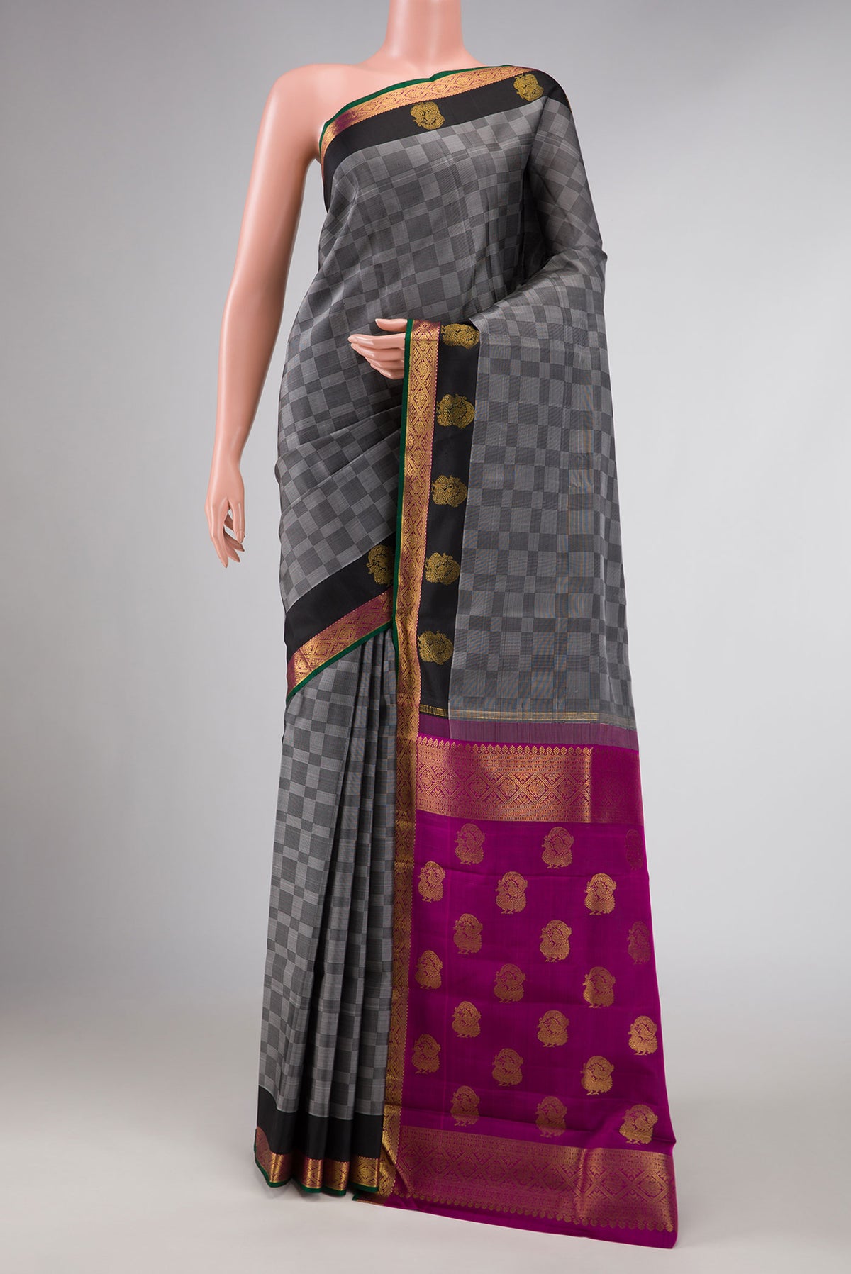 Grey Dual Tone Kanchipuram Silk Saree with Checked design on the body and Zari Border displayed on a mannequin