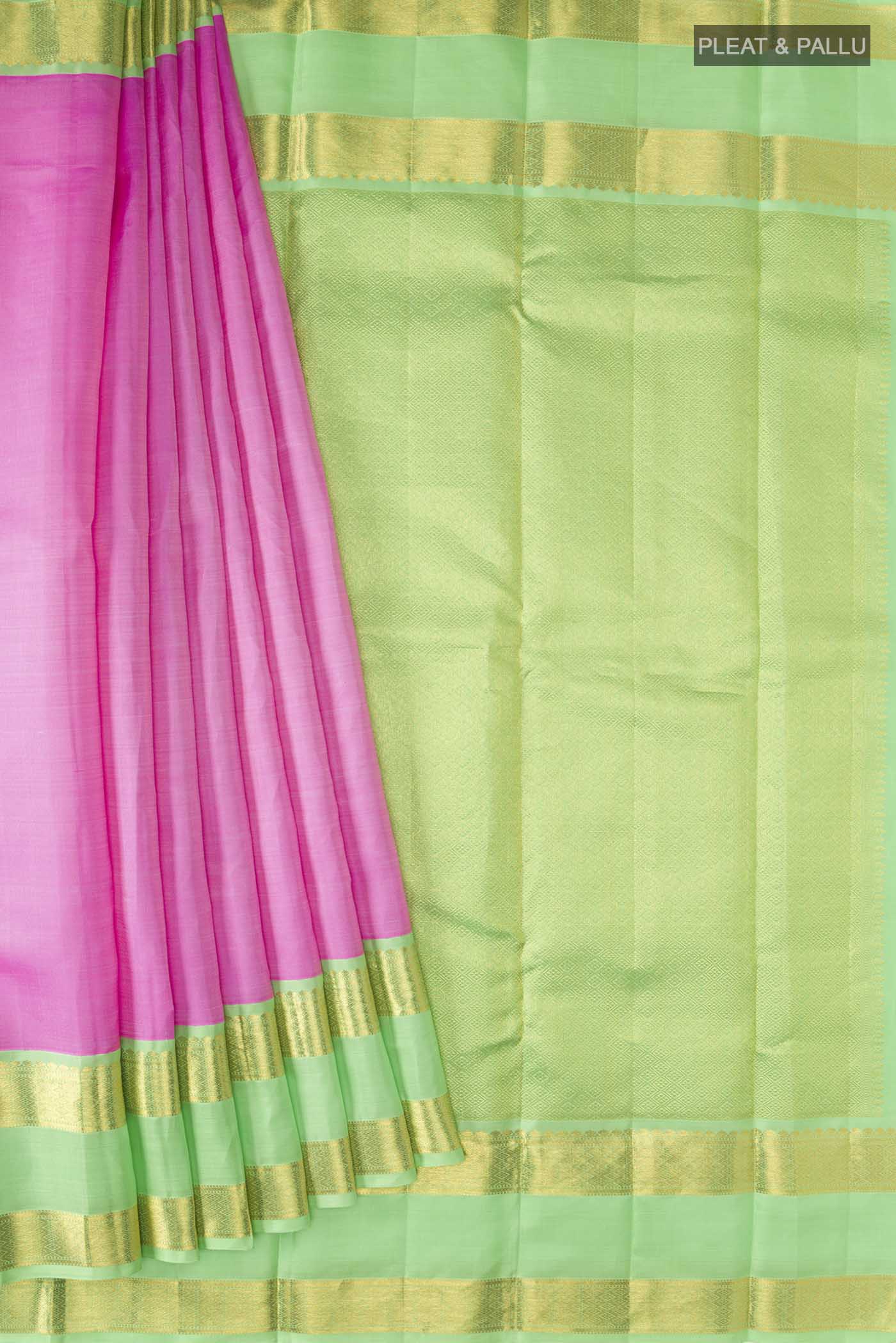Pleats and pallu of Pink Kanchipuram Silk Saree with Plain Body and Zari Border