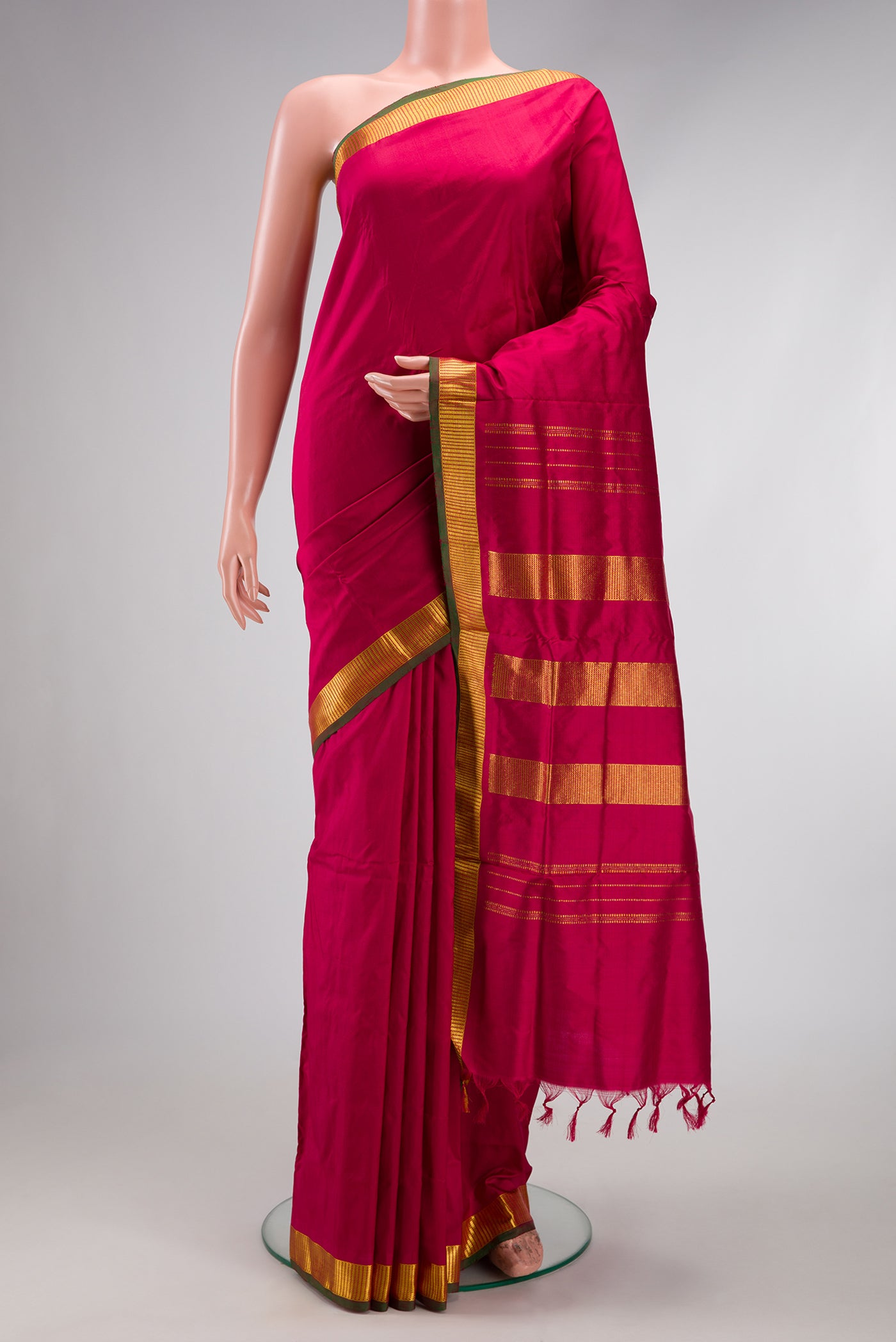 Pure Silk Pure Zari Maroon Kanjivaram Nine Yards Saree with Plain Body and Zari Border.  displayed on a mannequin