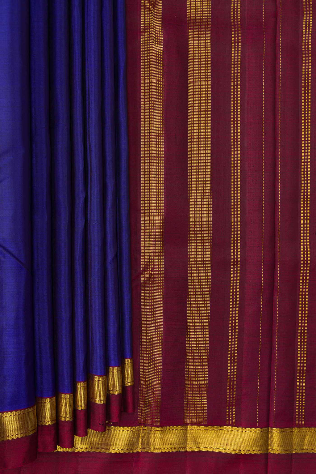 Pleats and pallu of Royal Blue Dual Tone Kanjivaram Silk Saree with Plain Body and Zari Border. 