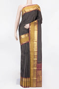 Black Dual Tone Kanchipuram Saree with Checked design on the body and Zari Border displayed on a mannequin