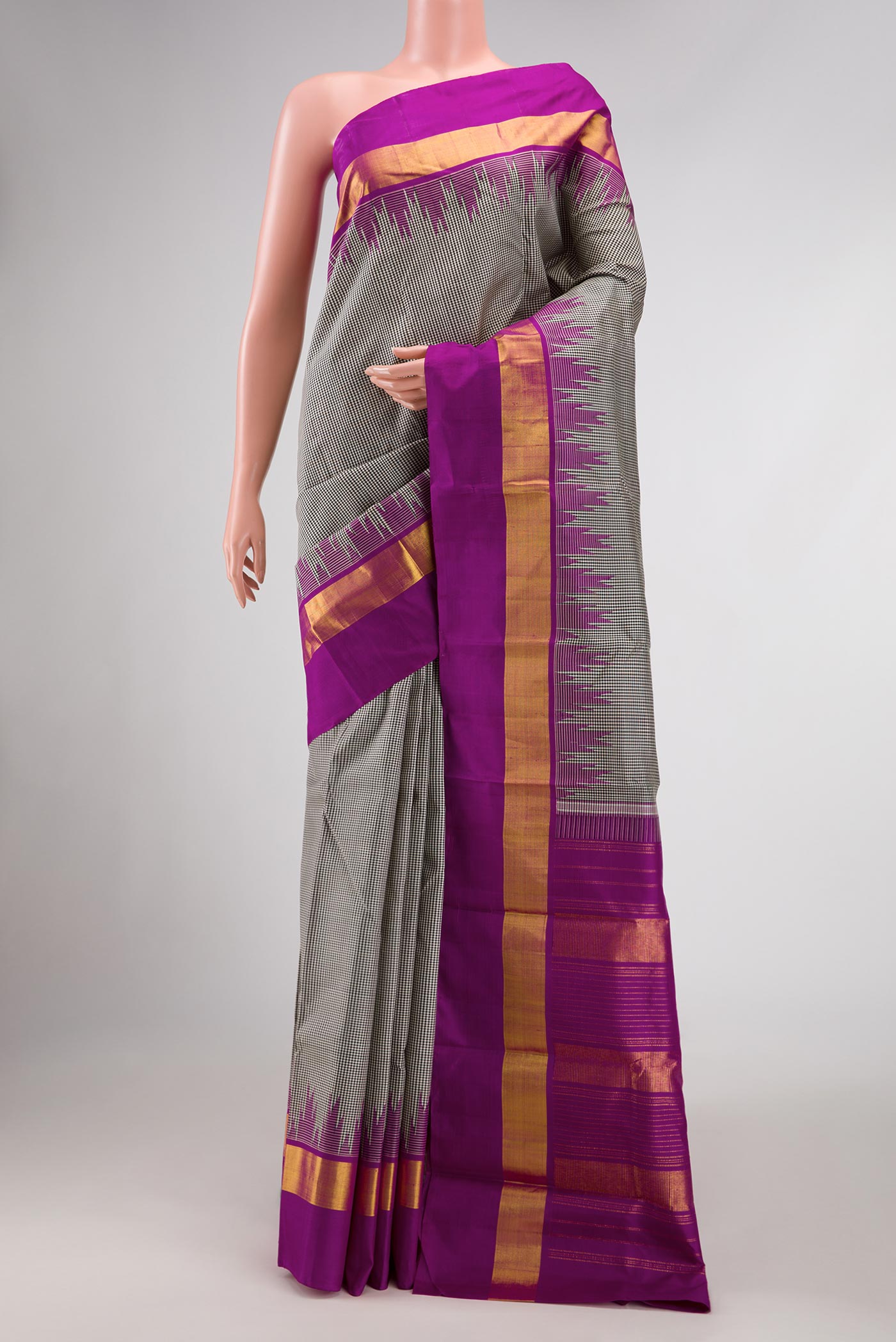 Off White Dual Tone Kanchipuram Silk Saree with Plain Body and Temple Border.  displayed on a mannequin