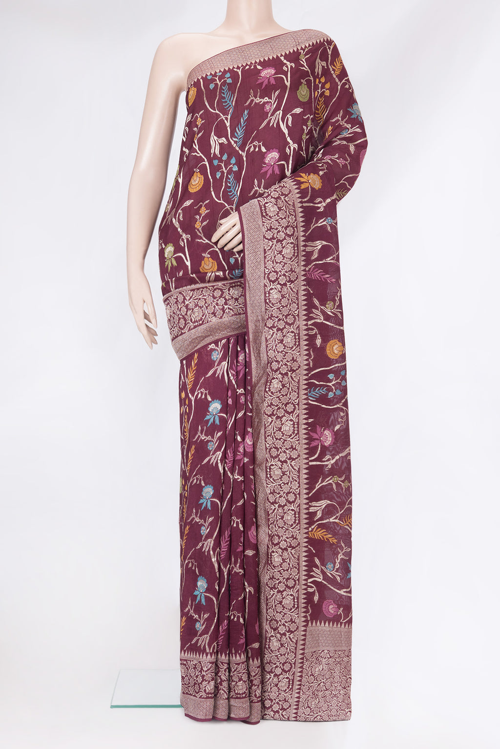 Burgundy Blended Banarasi Silk Saree with Zari Brocade on the body and Zari Border.  displayed on a mannequin