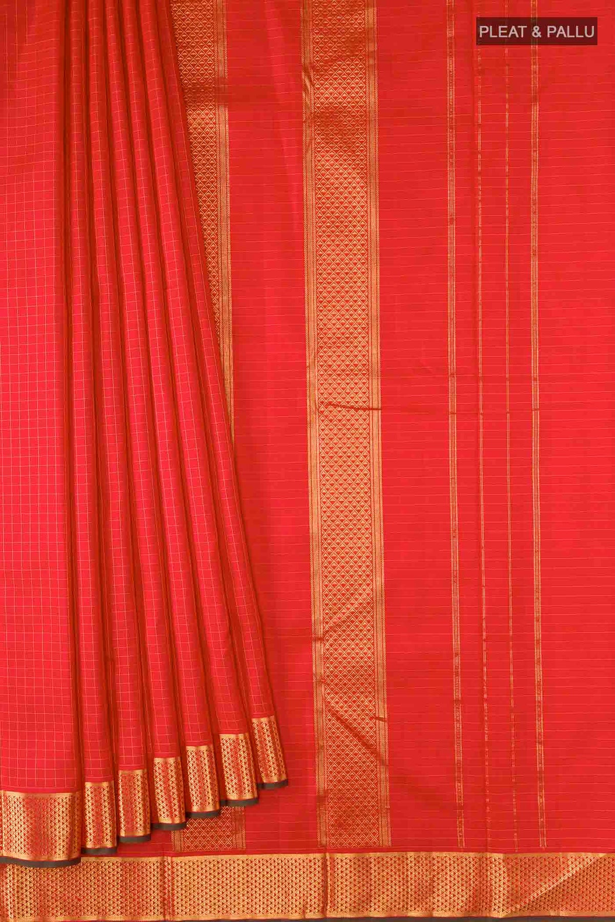 Pleats and pallu of Red Kanchipuram Silk Saree Checked design on the body and Zari Border